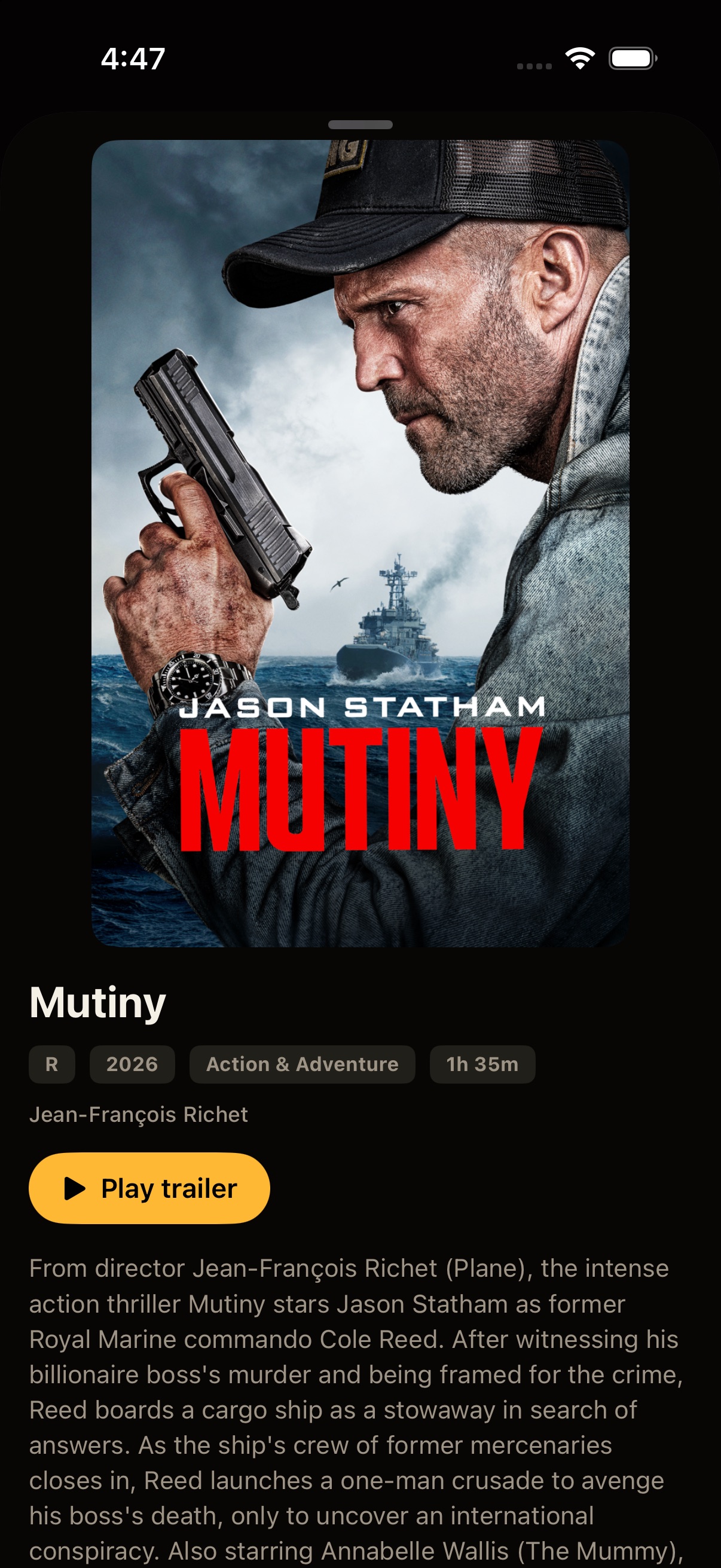 A movie page in Reel with poster, rating, runtime, plot, and a Play trailer button