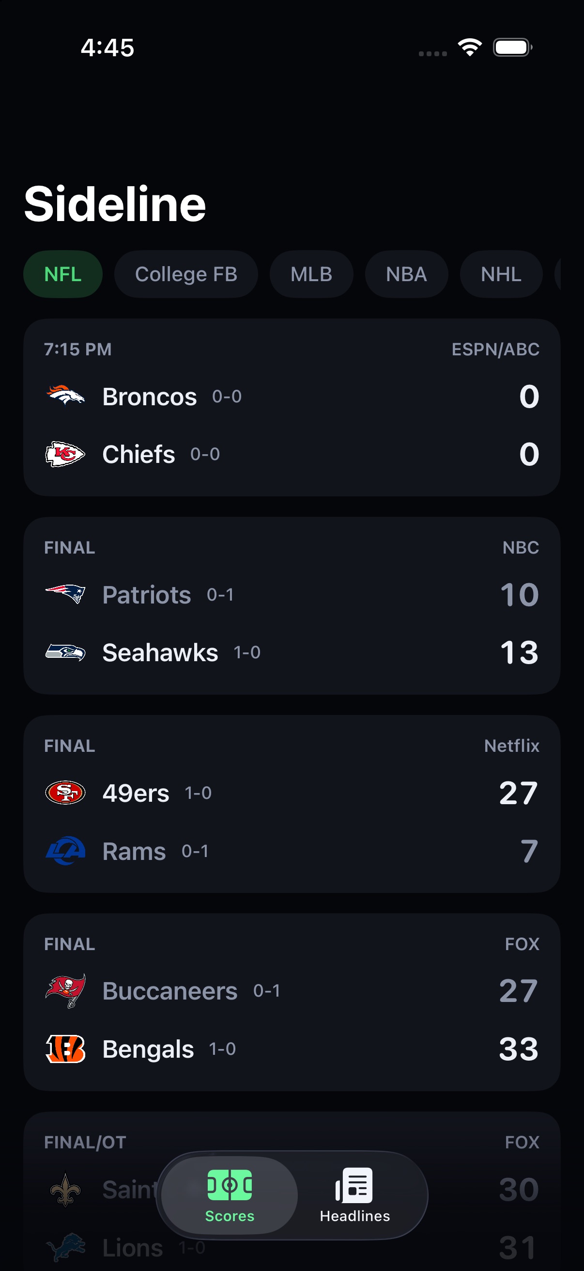 Sideline scoreboard showing NFL finals and upcoming games with team logos, records, and broadcast networks